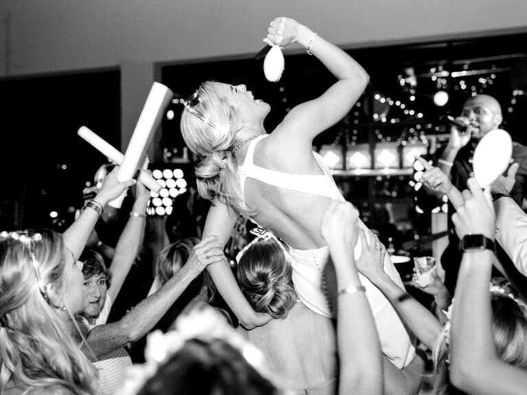 san antonio wedding band shown with bride crowdsurfing on the dance floor