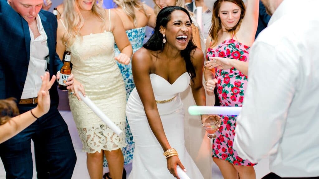 bride with her dallas wedding band on the dancefloor