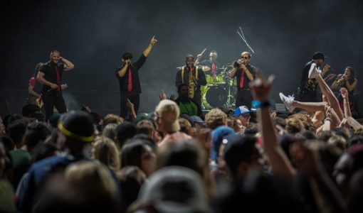 Corporate Event Band performing live on stage in Texas for large crowd at Baylor