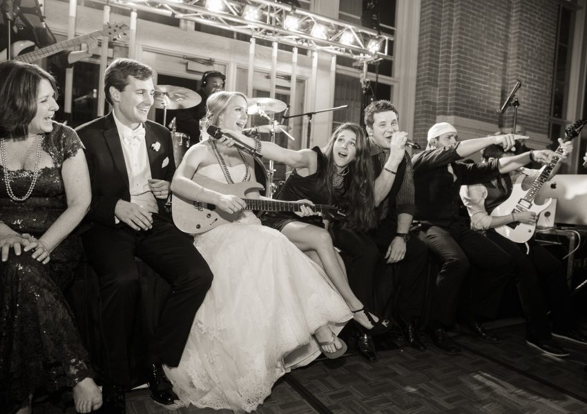 Bride and groom sing with Dallas wedding band - bw image